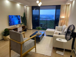 unparalleled luxurious elegant two bedroom apartment with heated swimming pool ,modern equipped gym, free parking space and relaxing rooftop with amazing city views